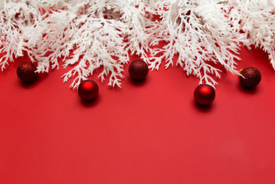 Different christmas decorations on the red background. high quality photo