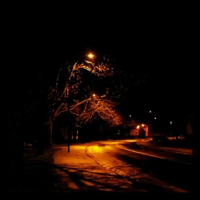 night, illuminated, road, street, street light, transportation, light trail, the way forward, long exposure, motion, road marking, lighting equipment, car, city, outdoors, speed, clear sky, copy space, city street, building exterior