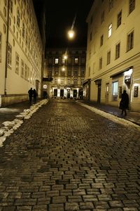 Illuminated buildings in city at night