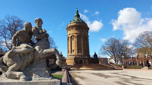 Low angle view of statue against sky