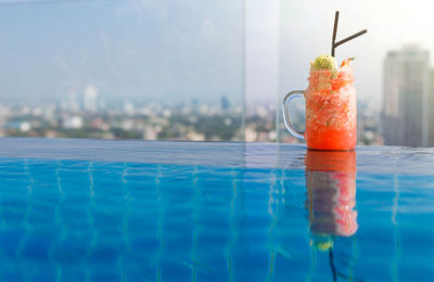 Water drops on glass at swimming pool