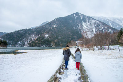 Scenic view of snow covered mountains