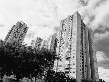 Low angle view of modern buildings against sky