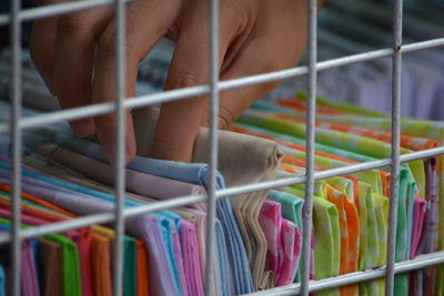 Full frame shot of multi colored metal in cage