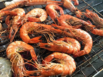 Shrimp on fire, closeup grilled shrimp on fire, shrimp crab on fire, hot grill, shrimp crab menu