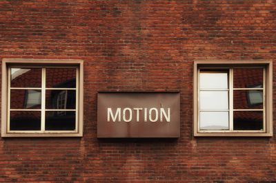 Information sign on wall of building