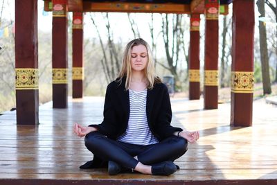 Full length of woman meditating