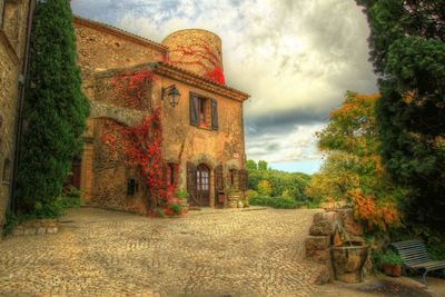View of building against cloudy sky