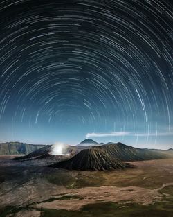 Star field against sky at night at bromo mountain, indonesia