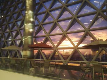 Low angle view of illuminated building against sky