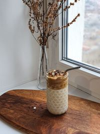 Close-up of glass of jar on table