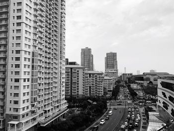 Skyscrapers in city against sky