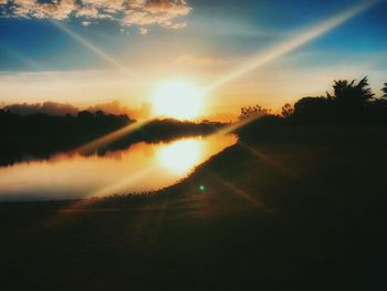 Scenic view of silhouette landscape against sky during sunset