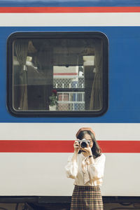 Portrait of man photographing