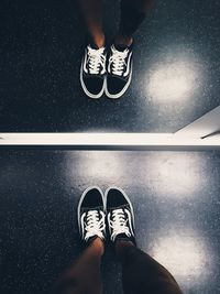 Low section of woman standing on floor