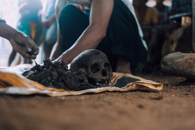 Reburying a set of human remains as a tradition in the mountains of the philippines. low angle shot