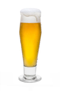 Close-up of beer glass against white background