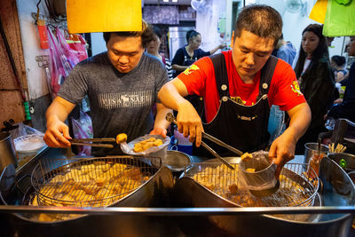 Group of people preparing food