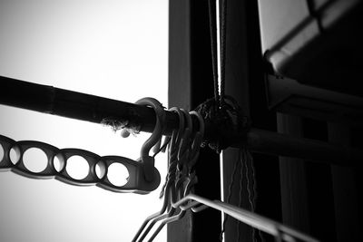 Close-up of rope tied to metal railing