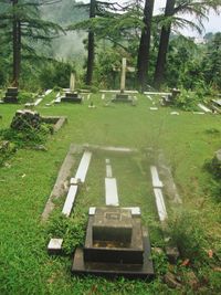 View of cross in cemetery