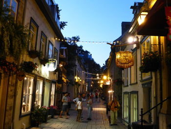 Illuminated street light in city