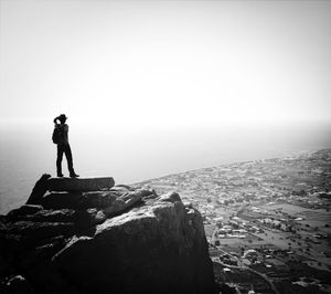 Woman standing on jetty