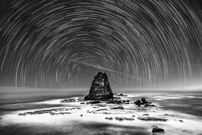 Scenic view of star field against sky at night