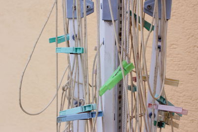 Close-up of pegs against the wall