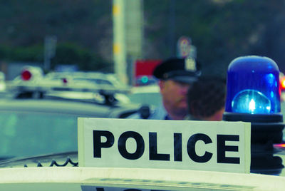 Close-up of police text on car