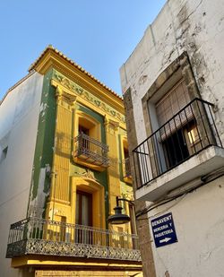 Low angle view of old building against clear sky