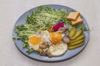 High angle view of food in plate on table