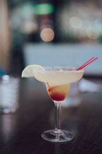 Close-up of wineglass on table