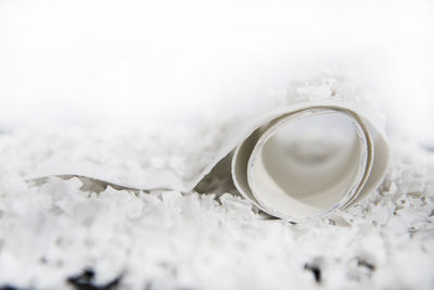 Close-up of wedding rings on white background