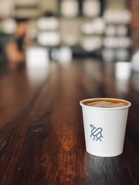 Close-up of coffee cup on table