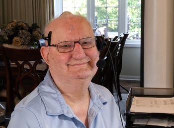 Portrait of senior man wearing sitting at home