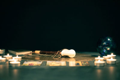 Close-up of chess pieces on table