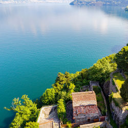 High angle view of building by sea against sky