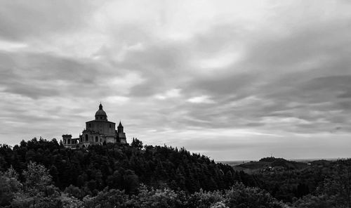 Historic building against cloudy sky