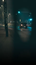 Cars on road at night