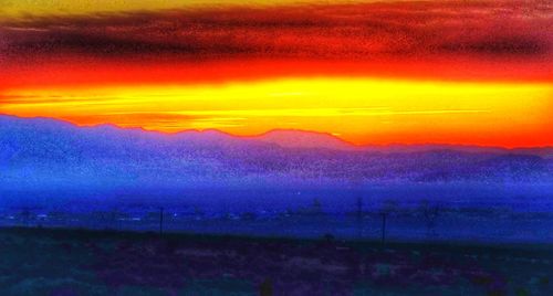 Scenic view of dramatic sky during sunset