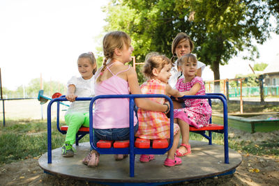 Group of people sitting outdoors