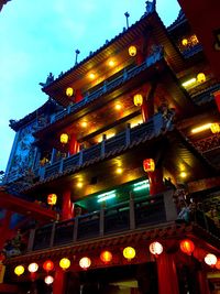 Low angle view of illuminated building