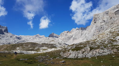 Panoramic view of snowcapped mountains against sky