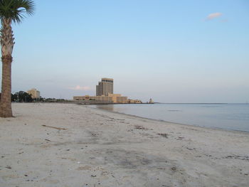 View of beach against blue sky