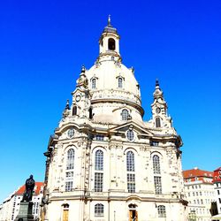 Low angle view of church against clear blue sky
