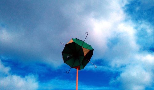 Low angle view of flag against sky