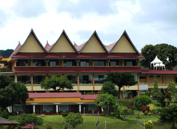 Building against cloudy sky