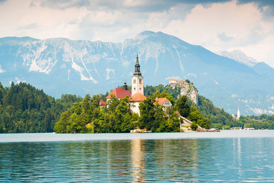 View of a lake with mountain range in background