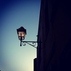 Low angle view of street light against clear sky