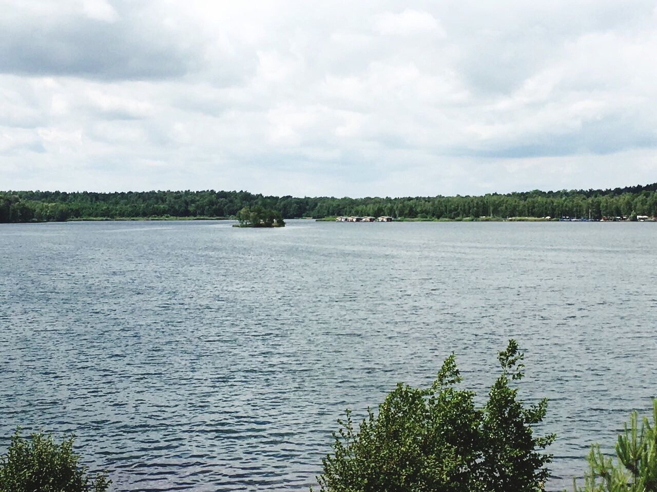 VIEW OF SEA AGAINST CLOUDY SKY